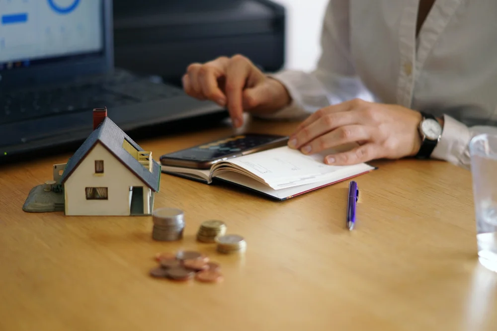 Closeup-shot-of-a-person-thinking-of-buying-or-selling-a-house